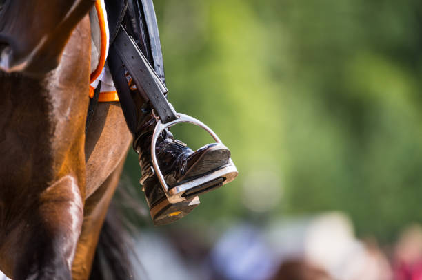 Stirrups hanging on a saddle offering safety comfort and riding balance